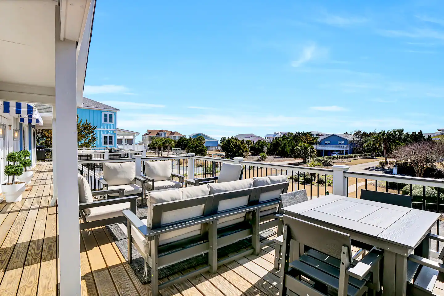 The covered deck with lounge seating